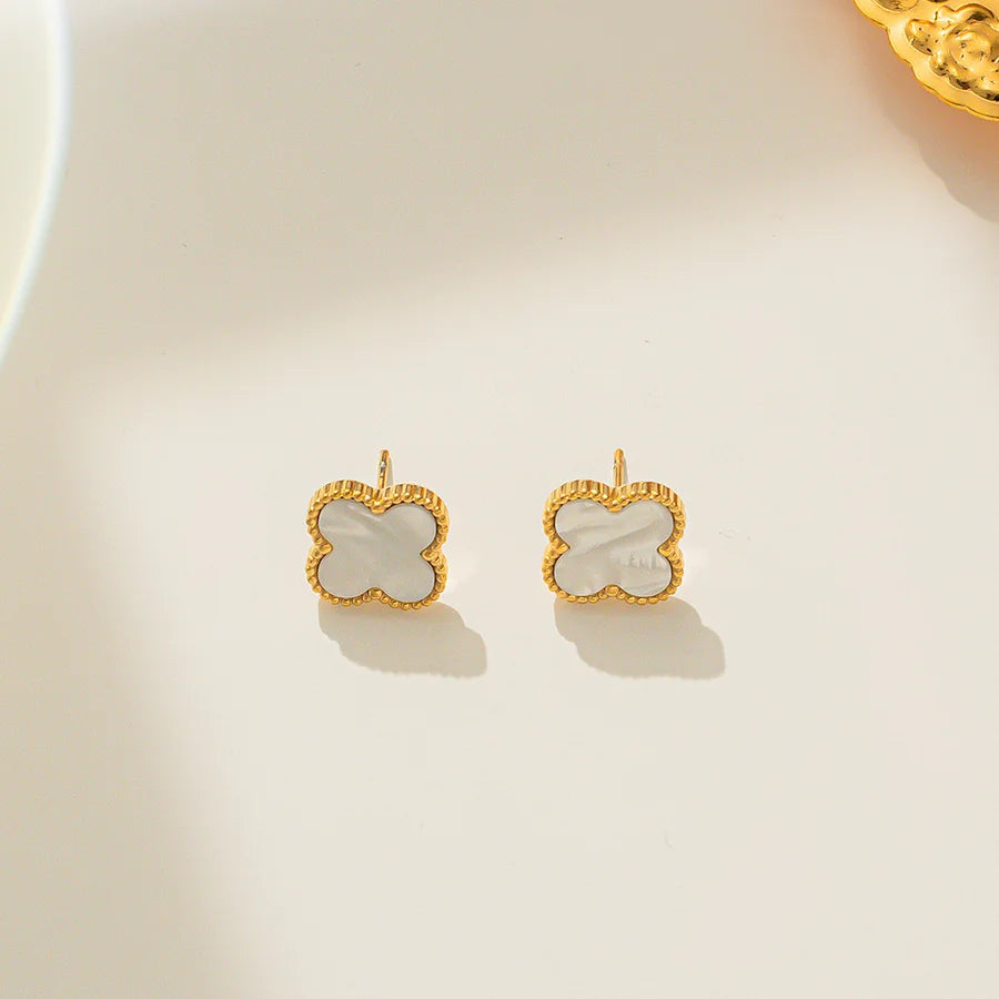 gold earrings me white clover shape